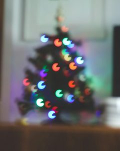 illuminated christmas tree in blur