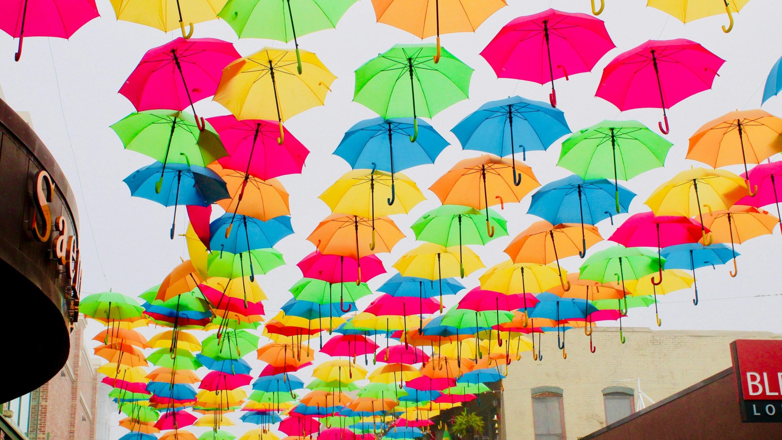 Summer Fete header image of bright parasols